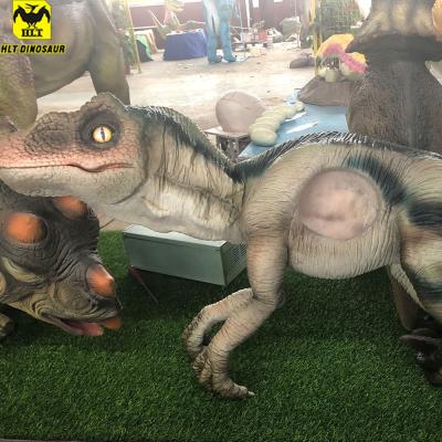 China Realistic Baby Dino Hand Puppet Silicone Hands Amusement Park Raptor Dinosaur Realistic Baby Puppet Realistic Baby Dino for sale