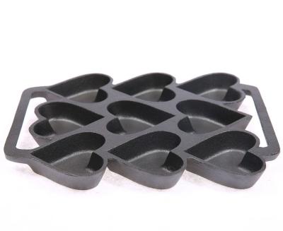 China Sustainable Cast Iron Pancake Pan For Making Heart Shape Mini Cake for sale