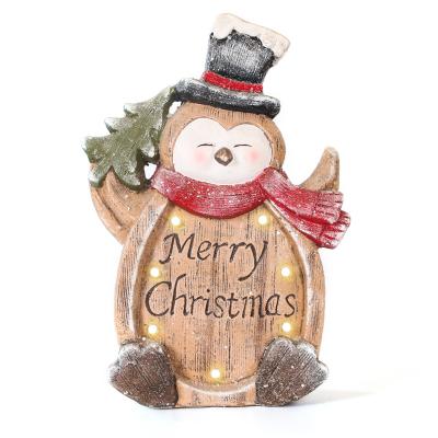 China Wholesale Cute Resin China Christmas Penguin Sculpture Christmas Message Penguin Santa Resin for sale