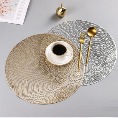 China Viable Hollow Out Gold Place Mat Vinyl Heat Insulation Non-Slip Kitchen Table Mats Rose Gold Washable Table Mats for sale