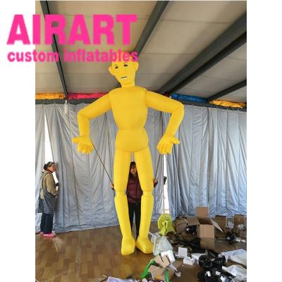 China PVC tarpaulin cloth/420D Oxford clothes giant outdoor decoration inflatable yellow color puppet balloon for sale