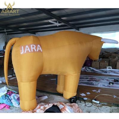 China Oxford Cloth Yellow Inflatable Bull Bullfighting Animal Inflatable Costume for sale