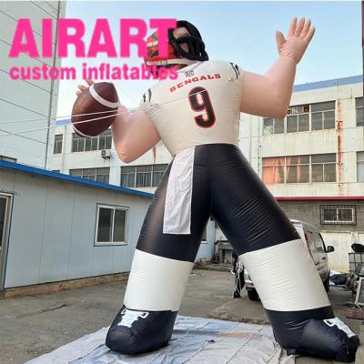 China PVC tarpaulin cloth/420D Oxford clothes giant advertising football player printing logo inflatable balloon for sale