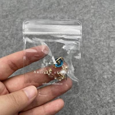 China Moisture Proof Mini Plastic Packaging Bag For Jewelry Necklace Zipper Bag Custom Clear PVC Ziplock Bag for sale