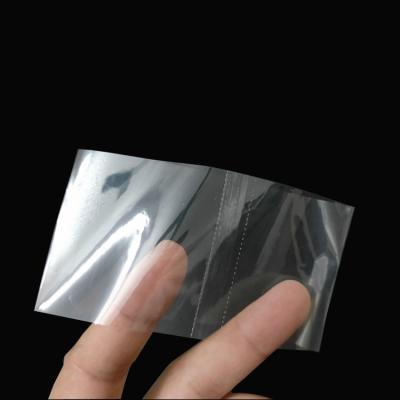 China Moisture Proof Clear Perforated Shrink Tape Heat Shrink Wrap Tamper Seal for sale