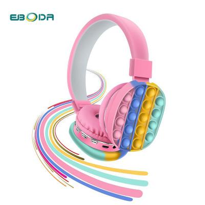 China Wireless Stereo Toy Rainbow Fidget Headphone Creative Portable Music Headset Decompression Silicone Earphone Toy for sale