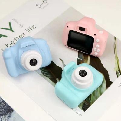 China Child Camera In Running Mini Educational Toys For Children Digital Camera 1080P Projection Kids Photo Digital Camera Video for sale