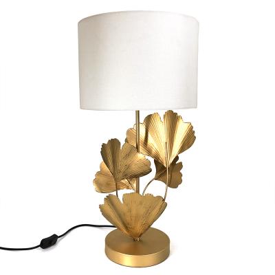 China European Shape Gold Leaf Retro Ginkgo Iron Bedroom Table Lamp With Fabric Lampshade for sale