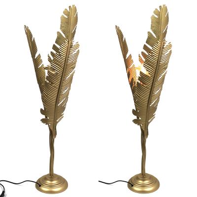 China Custom industrial antique palm leaf metal gold floor lamp floor lamp for living room for sale