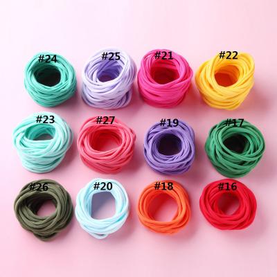 China New Style Traceless Headbands Thin Soft Stretchy Nylon Skinny Kids Babies Low Headband Hair Accessories for sale