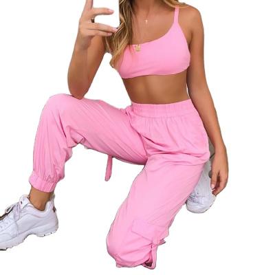 China Anti-wrinkle Latest Designer Custom Logo Solid Tracksuits Two Piece Sets Women Tops And Pants for sale