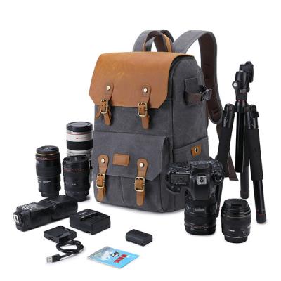 China Waxed Canvas 30L Outdoor Waterproof Backpack Travel Camera Bag for sale