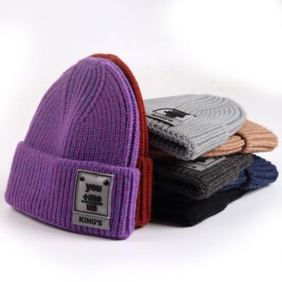 China New COMMON Style Custom Made Jacquard Knitted Winter Hats All Over Print Logo Beanie Hats for sale