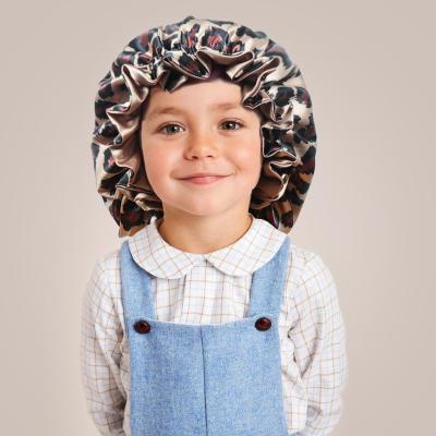 China Double-layer silk hood leopard hair cap-copy children's sleep hat baby shower hat and fashion mother's hair hood with wooden ear rim for sale