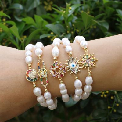 China Manufacturer Supply Modern China White Freshwater Pearl Beads Bracelet With Charm for sale