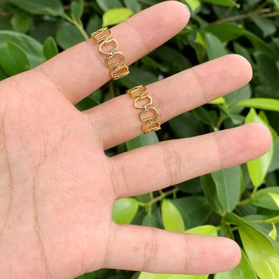 China 2021 Romantic Hot Selling Hollow Five Finger Palm Gold Plated Ring Adjustable Ring Open Palm Finger Ring for sale