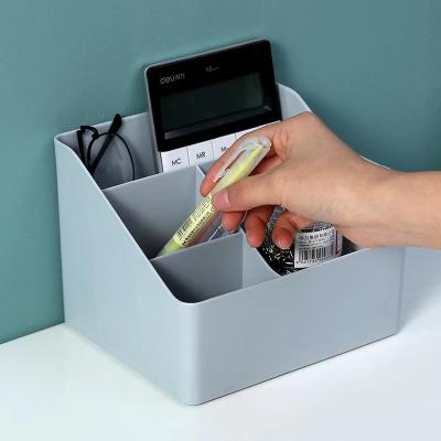 China Viable Universal Remote Control Plastic Desktop Sundries Shelf Storage Debris Stationary Storage Box with 4 Divides for sale