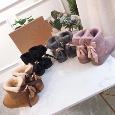 China Rubber Original USA Brand Winter Snow Boots Quality Luxury Designer Ugging Snow Rubber Wool Boots For Women Kids Shoes Warm Snow Boots for sale