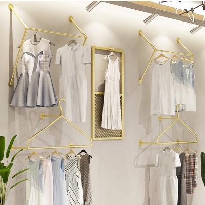 China Shinny Fashion Display Gold Display Hanger Stand Up Stainless Steel Clothing Rack Metal Rack Shelf In Store Sales for sale