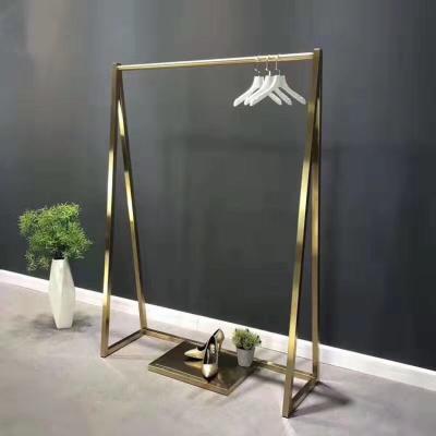 China Gold Wholesale Store Fashion Clothing Display Case Dress Metal Display Rack Hanging Shelf For Shop Home for sale