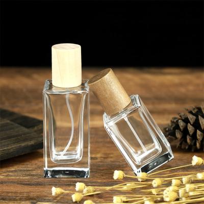 China Cosmetics Packaging 50ml Empty Cosmetic Clear Rectangle 30ml 100ml Pressed Perfume Spray Bottle for sale