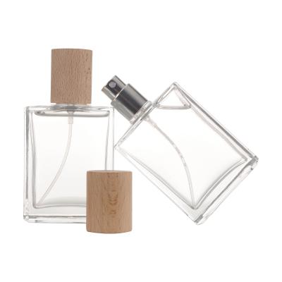 China Cosmetic Wholesale New Design Luxury Transparent Cylinder 100ml Spray Frosted Glass Perfume Bottle for sale