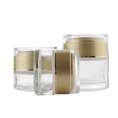 China Custom luxury cosmetic packaging 20g 30g 50g cream jar clear round glass with gold acrylic cap for sale