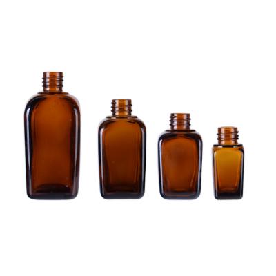 China Cosmetic 30ml 50ml 100ml Brown Amber Square Glass Bottle With Eye Cream Pharmaceutical Screw Caps for sale