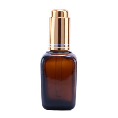 China Top Shoulder 10ml 30ml 50ml 100ml Square Push Button Serum Fancy Flat Glass Oil Dropper Bottle for sale