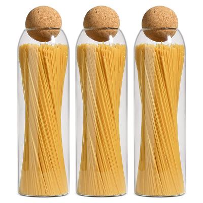 China Freshness Preservation Tube Shaped Airtight Borosilicate Cookie And Nuts Storage Glass Jars Set With Bamboo Lids for sale