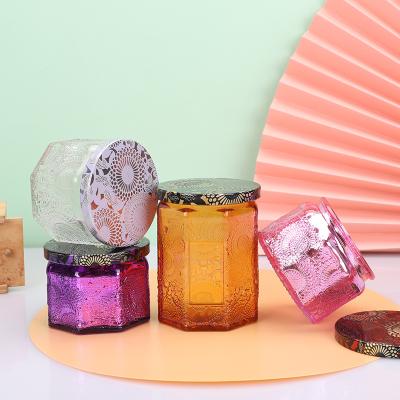 China Home Decoration Candle Jars Nordic Suppliers 4oz Elegant Rose Etched Embossed Glass Colored Candle Jars for sale