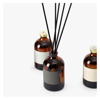 China High Quality 50ml Aromatherapy Bedroom Decorative Amber Round Shape Aromatherapy Glass Bottle Botol Reed Diffuser for sale