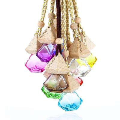 China Gift & Craft Wholesale 8ml Empty Clear Air Freshener Diffuser Car Hanging Perfume Bottle With Wooden Cap for sale