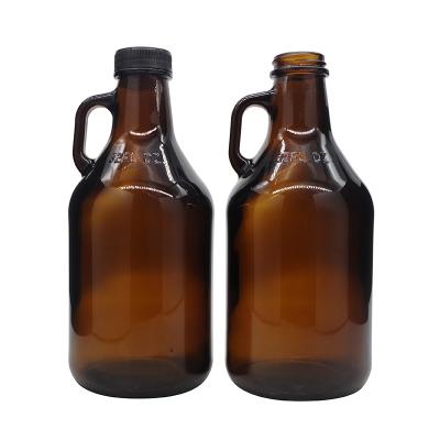 China Gift & Craft Hot Sale California 32oz Large Round Liquor Bottles 64oz Empty Glass Liquor Bottle With Holder And Cap for sale