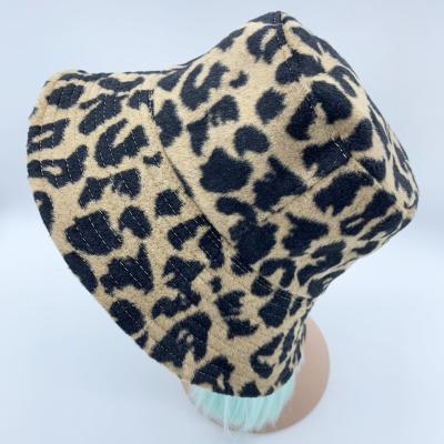 China Fashion newest luxury ladies double sided reversible leopard bucket hat wide brim winter sunscreen basin hat for sale