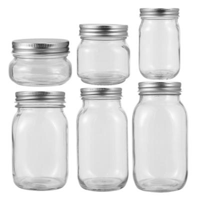 China Custom Logo 8oz16oz Wide Mouth Cover Mason Jar Ball Mason Jar Glass With Clear Lids Box for sale