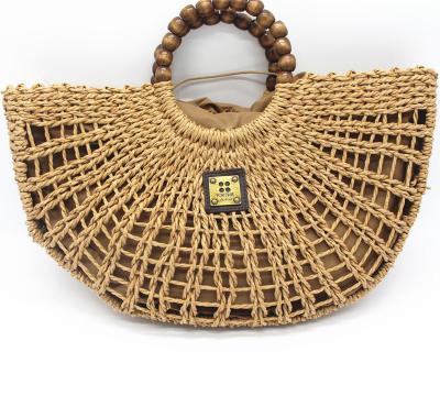 China Fashion Pearl Wood Round Handle Straw Bags Hollow Paper Handmade Summer for sale