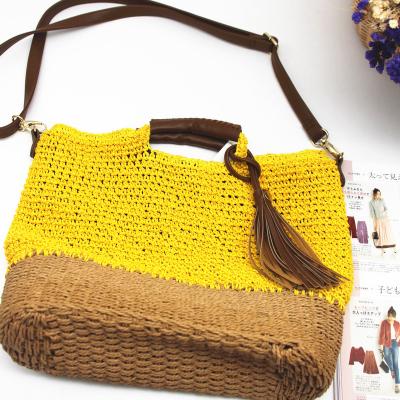 China Fashion Style New High Quality Tassel Woven Crochet Tote Beach Paper Bag for sale