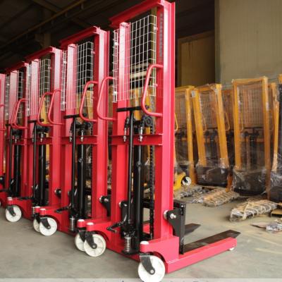 China Small Manual Hydraulic Fork Stacker 1 Ton 2 Tons Lifting And Transporting Truck for sale