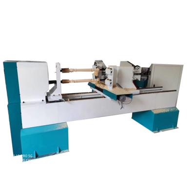 China Portable wood lathe woodworking tools furniture lathe machine CNC wood turning cone lathe machine for sale