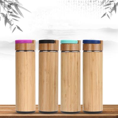 China Sustainable Portable Thermos Rope 550ml Tea Lift Tea Drinking Bamboo Water Bottle Tumbler for sale