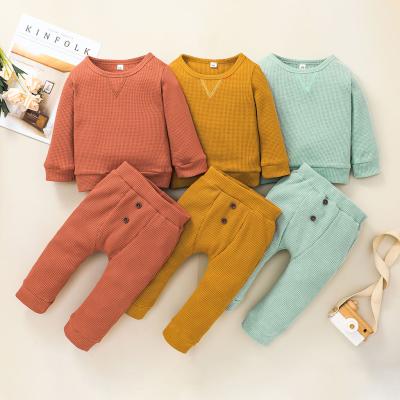 China Factory Sale Solid Color Baby Boy Set Breathable Waffle Long Sleeve Windproof Pajamas 2pcs Kids Casual Clothing for sale