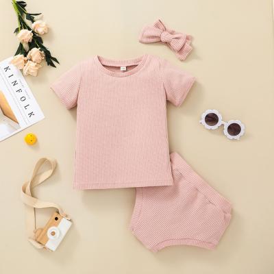 China Hot sale summer solid color anti-static cotton knitted pants suit quality shorts sleeve kids clothing 2pcs for sale