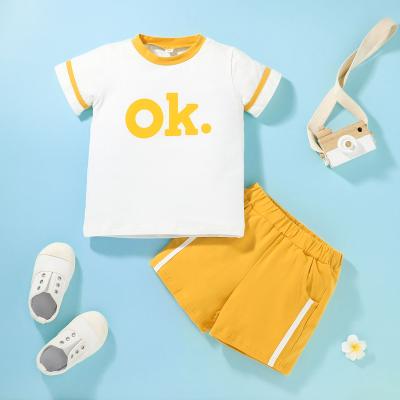 China Fast Delivery Light Color Athlete Style Matching Casual 2pcs Letter Printed Short Sleeve Summer Cotton Children Boy Kids Clothing Set for sale