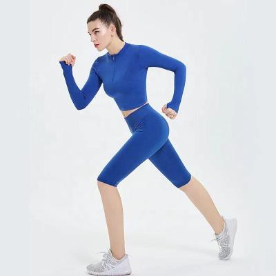 China 2022 New Stain Solid Color Seamless Women's Breathable Sports Fitness Clothes Long Sleeve Five Point Shorts Yoga Clothes for sale