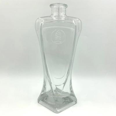 China Classic Glass Wine Bottles Emboss Custom Bath Salt Water Baby Glass Bottle Sets for sale