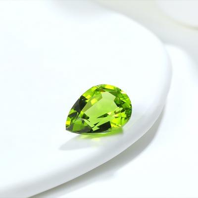 China Yellowish Green Good Quality Olivine Jewelry Third Party Appraisal Yellowish Green Natural Pear Olivine Grc Ngtc CS Gems Birefringence and Pleochroism Loose Stone for sale