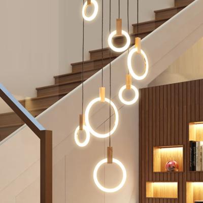 China Nordic modern circular round metal ceiling hanging modern brushed gold kitchen metal hotel lighting led pendant light for sale