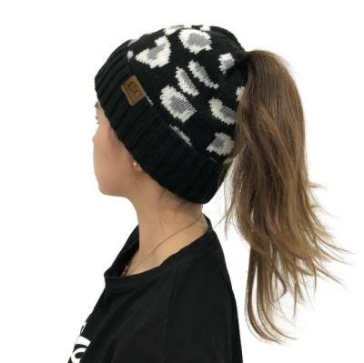 China COMMON Winter Knitted Wool Hat Leopard Yarn Wool Hat For Women for sale