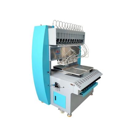 China Printing Shops Garment Machine For Labels Factory Silicone Rubber Patch Dispenser Machine for sale